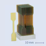 First Standardized Material Testing of 2PP 3D-Printed Parts